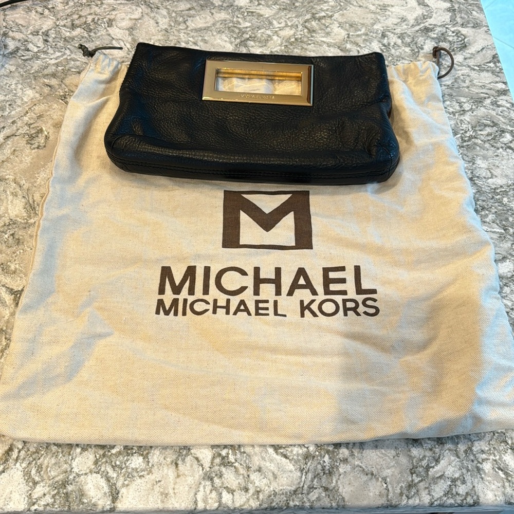 Michael Kors authentic black leather handbag with gold detail